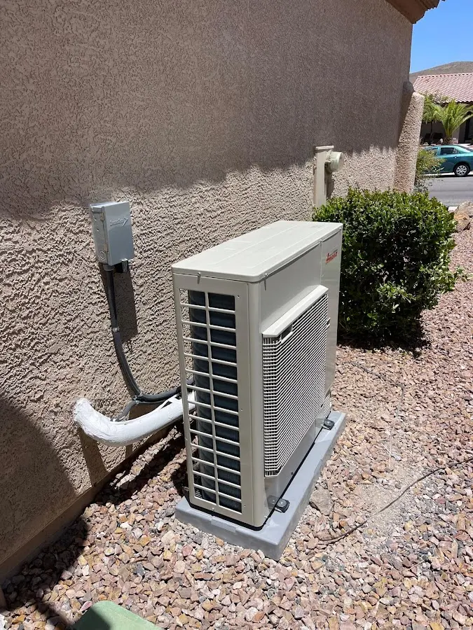 Residential air conditioning condenser unit in Kingsburg